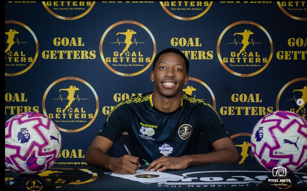 U17 lifting the regional trophy